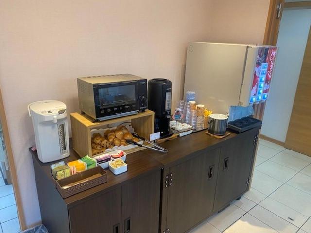 Hotel Sakurano Familia Nago Buitenkant foto